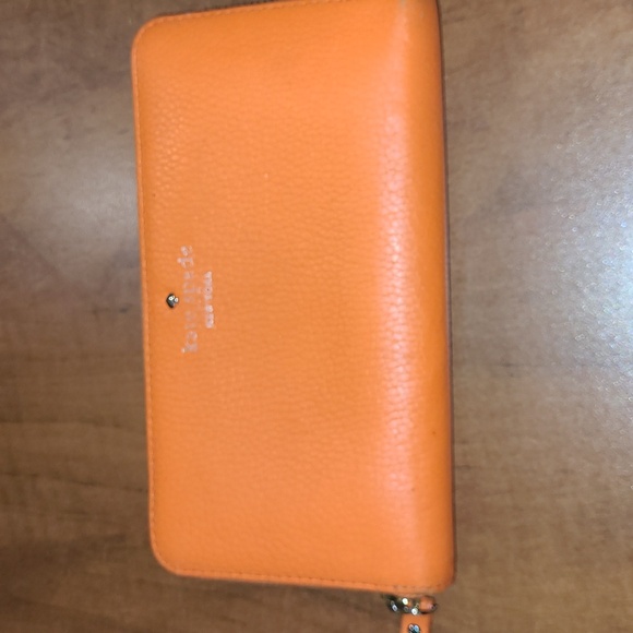 kate spade Handbags - Kate Spade Beautiful  Pebble Leather kate spade wallet BRIGHT ORANGE. Pre-loved